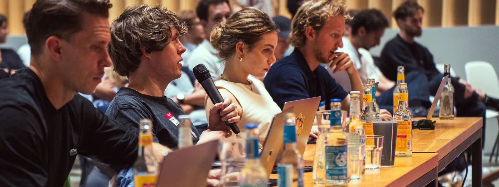 SummerUP 2025 jury listening to a team pitch on Pitch Day
